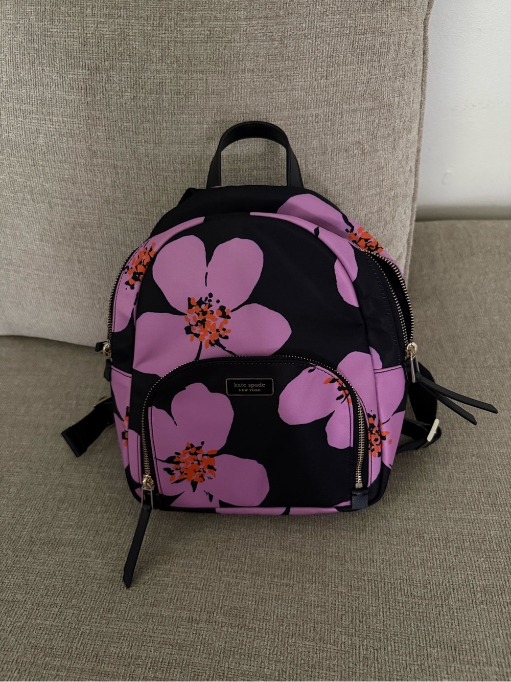 kate spade black backpack with lavender floral print